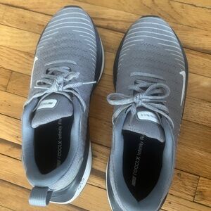 Nike women’s  Silver and Black Athletic Shoes